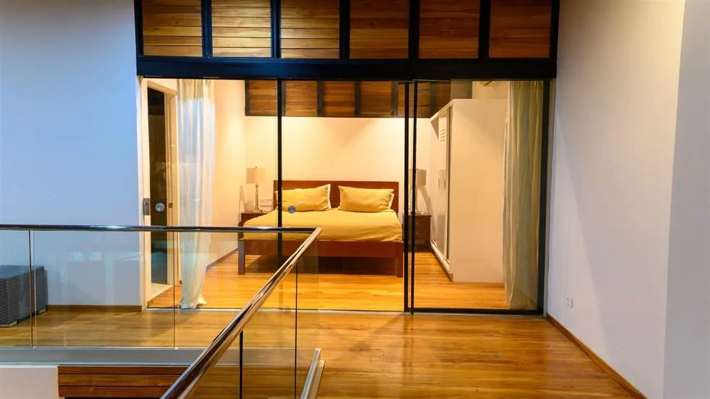 Bright, decluttered primary bedroom